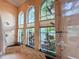 Bright and airy shower with large windows and a dual showerhead system at 13305 Bellaria Cir, Windermere, FL 34786