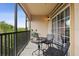 Enjoy the outdoors on this relaxing balcony with chairs and a table, with a great outdoor view at 1375 Tuscana Ln # 1406, Davenport, FL 33896