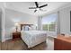 Bright bedroom with a ceiling fan and a comfortable bed at 1375 Tuscana Ln # 1406, Davenport, FL 33896