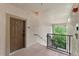 Condominium entrance featuring a private walkway and stylish, secure front door at 1375 Tuscana Ln # 1406, Davenport, FL 33896
