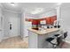 Bright kitchen with updated appliances, granite countertops, and breakfast bar at 1375 Tuscana Ln # 1406, Davenport, FL 33896
