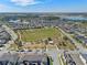 Primary-planned community boasts a lush central park and scenic walking trails with multiple lakes in background at 16144 Parkwyn St, Winter Garden, FL 34787