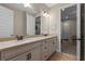 Double vanity bathroom with modern lighting, mirrors, and neutral tones for a sleek, clean look at 16144 Parkwyn St, Winter Garden, FL 34787