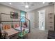 Spacious bedroom with a house frame bed, playroom decor, and ample closet space at 16144 Parkwyn St, Winter Garden, FL 34787