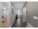Hallway featuring wood-look flooring and ample recessed lighting at 16144 Parkwyn St, Winter Garden, FL 34787