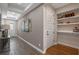 Hallway featuring wood-look flooring and ample recessed lighting at 16144 Parkwyn St, Winter Garden, FL 34787