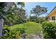 Expansive backyard featuring greenery and natural light at 215 Forrest Dr, Sanford, FL 32773