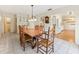 Bright dining room featuring a wooden dining set and built-in cabinets with great natural light at 215 Forrest Dr, Sanford, FL 32773