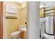 Powder room located next to the laundry room at 215 Forrest Dr, Sanford, FL 32773