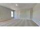 Bright bedroom with neutral carpet and closet space at 2156 Fish Eagle St, Clermont, FL 34714