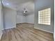 Bright and airy living room with vaulted ceilings and hardwood flooring at 2156 Fish Eagle St, Clermont, FL 34714