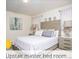 Comfortable bedroom featuring a stylish wooden headboard and neutral decor at 218 Ocean Course Ave, Davenport, FL 33896