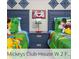 Fun bedroom with two twin beds and playful Mickey Mouse-themed decor at 218 Ocean Course Ave, Davenport, FL 33896