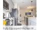 Bright, modern kitchen with stainless steel appliances and ample counter space at 218 Ocean Course Ave, Davenport, FL 33896