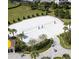 Community volleyball court with manicured landscaping and seating at 218 Ocean Course Ave, Davenport, FL 33896