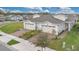 Exterior elevation showcasing the front of this townhome with attached garages at 2312 Datura Loop, St Cloud, FL 34772