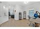 Functional office space featuring a computer setup, bookshelves and great natural lighting at 2312 Datura Loop, St Cloud, FL 34772