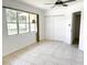 Bright bedroom with a large window and new flooring, showing natural light at 236 Eldorado Dr, Debary, FL 32713
