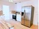 Spacious kitchen featuring stainless steel appliances, wood countertops and tiled backsplash at 236 Eldorado Dr, Debary, FL 32713