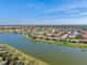 Waterfront community homes are nestled along the lake, many with private boat docks at 2541 Shoal Bass Way, Kissimmee, FL 34746