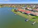 Scenic aerial shot of waterfront homes boasting private docks and lake access for boating at 2541 Shoal Bass Way, Kissimmee, FL 34746