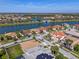 Expansive aerial view showcasing the community's lakefront homes and landscaped surroundings at 2541 Shoal Bass Way, Kissimmee, FL 34746