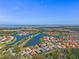 Expansive view of a lakefront community featuring beautiful homes and waterways at 2541 Shoal Bass Way, Kissimmee, FL 34746