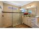 Spacious bathroom featuring a frameless glass shower and modern fixtures at 2541 Shoal Bass Way, Kissimmee, FL 34746