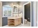 Bathroom featuring a single sink, white tile floors and gray-blue walls at 2747 Kissimmee Bay Cir, Kissimmee, FL 34744