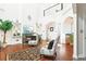 Bright living room with a fireplace, high ceilings, hardwood floors and decorative shelving at 2747 Kissimmee Bay Cir, Kissimmee, FL 34744