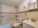 Bathroom showcasing neutral tile, a tub, and a vanity sink at 3242 S Semoran Blvd # 21, Orlando, FL 32822