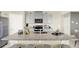 Kitchen featuring gray cabinets, stainless steel appliances, and a large granite countertop island at 3633 Salvia Ct, Tavares, FL 32778