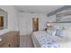 Well-lit bedroom with a coastal decor, plush carpet, and ample space at 3893 Diving Dove Ln, Bartow, FL 33830