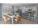 Charming dining area adjacent to kitchen, featuring modern decor and ample seating at 3893 Diving Dove Ln, Bartow, FL 33830