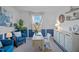 Stylish home office with modern decor, comfortable seating, and plenty of natural light at 3893 Diving Dove Ln, Bartow, FL 33830