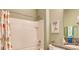 Bathroom with a shower and tub combination, decorated with a seahorse shower curtain at 3965 Kennebunk Loop, Mount Dora, FL 32757