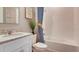 Clean bathroom showcasing a vanity with countertop, modern fixtures, and a shower-tub combination at 3971 Kennebunk Loop, Mount Dora, FL 32757