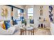 Stylish and bright living room featuring modern decor and comfortable seating for guests at 3971 Kennebunk Loop, Mount Dora, FL 32757