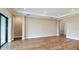 Spacious living room with tile floor and neutral paint at 4197 Barbuda Ln, Kissimmee, FL 34758