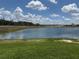 Scenic lake view, highlighting the natural beauty surrounding the property and community at 4203 Barbuda Ln, Kissimmee, FL 34758