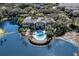 Aerial image highlights community amenities, pool, and landscaping at 5144 City St # 238, Orlando, FL 32839