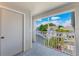 Balcony overlooking a courtyard with mature trees and community views at 5144 City St # 238, Orlando, FL 32839