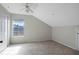 Bright bedroom with a large window offering natural light and a neutral color palette at 5144 City St # 238, Orlando, FL 32839