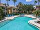 Resort-style pool with lounge chairs, perfect for relaxation in a luxurious apartment community at 5144 City St # 238, Orlando, FL 32839