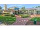 Charming poolside bistro with inviting outdoor seating and lush landscaping at 5144 City St # 238, Orlando, FL 32839