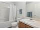 Well-lit bathroom with a shower-tub combination and a vanity, offering functionality and comfort at 612 Old Pine Ct, Sanford, FL 32773