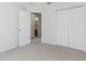 Bedroom featuring neutral walls, carpet, and a closet, offering a cozy and inviting space at 612 Old Pine Ct, Sanford, FL 32773