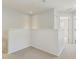Bright hallway area with neutral carpet and white walls leading to additional rooms at 612 Old Pine Ct, Sanford, FL 32773