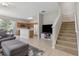 Inviting open floor plan seamlessly connecting the living room and kitchen at 612 Old Pine Ct, Sanford, FL 32773