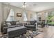 Bright living room featuring stylish furniture, a rug, and a dining area at 612 Old Pine Ct, Sanford, FL 32773